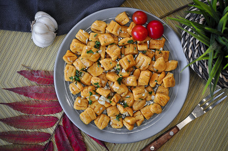 Pumpkin gnocchi with pumpkin seed oil and garlic